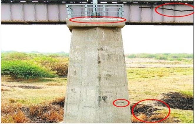 Railway bridge pier with inspection markings