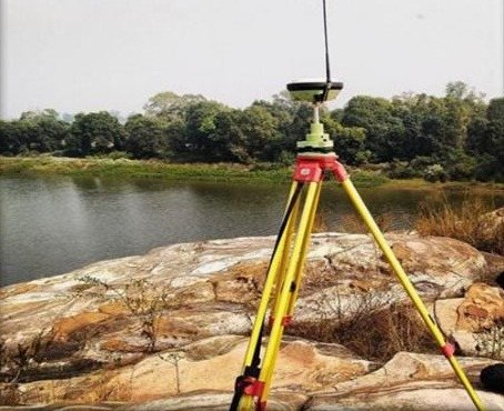 GNSS survey instrument set up beside the river at Talabira